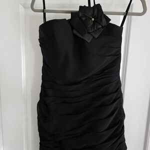 Chic Black Strapless Dress with Bow Detail